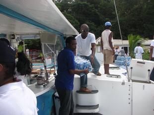 Image #7 - Hurricane Tomas Relief Effort (Packing the goods)